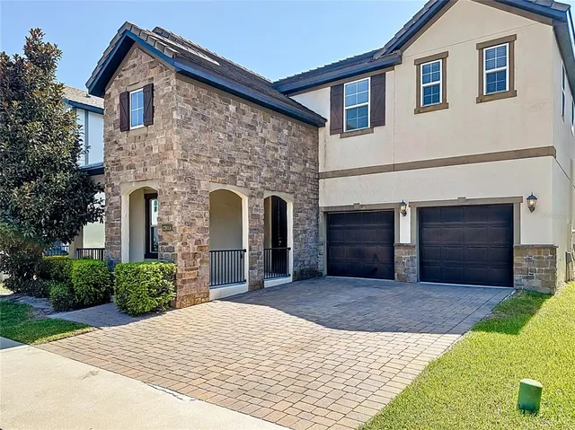 a house view with a garden space
