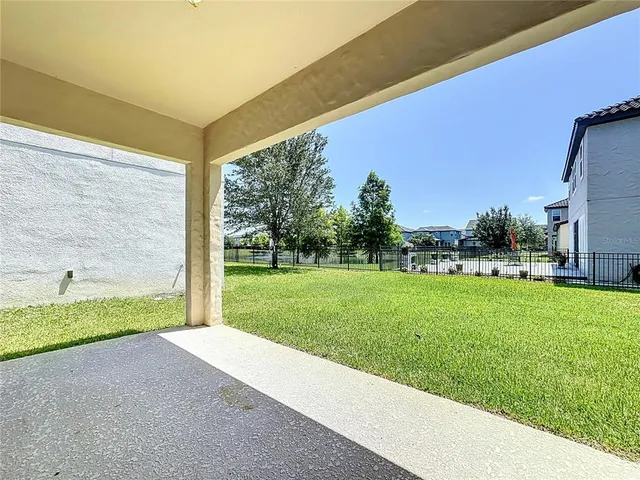 a view of a garden with an outdoor space