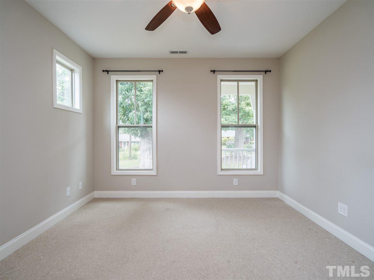 2308 Milburnie Road Raleigh, NC 27610 - Photo 14 of 25 a view of room window and ceiling fan