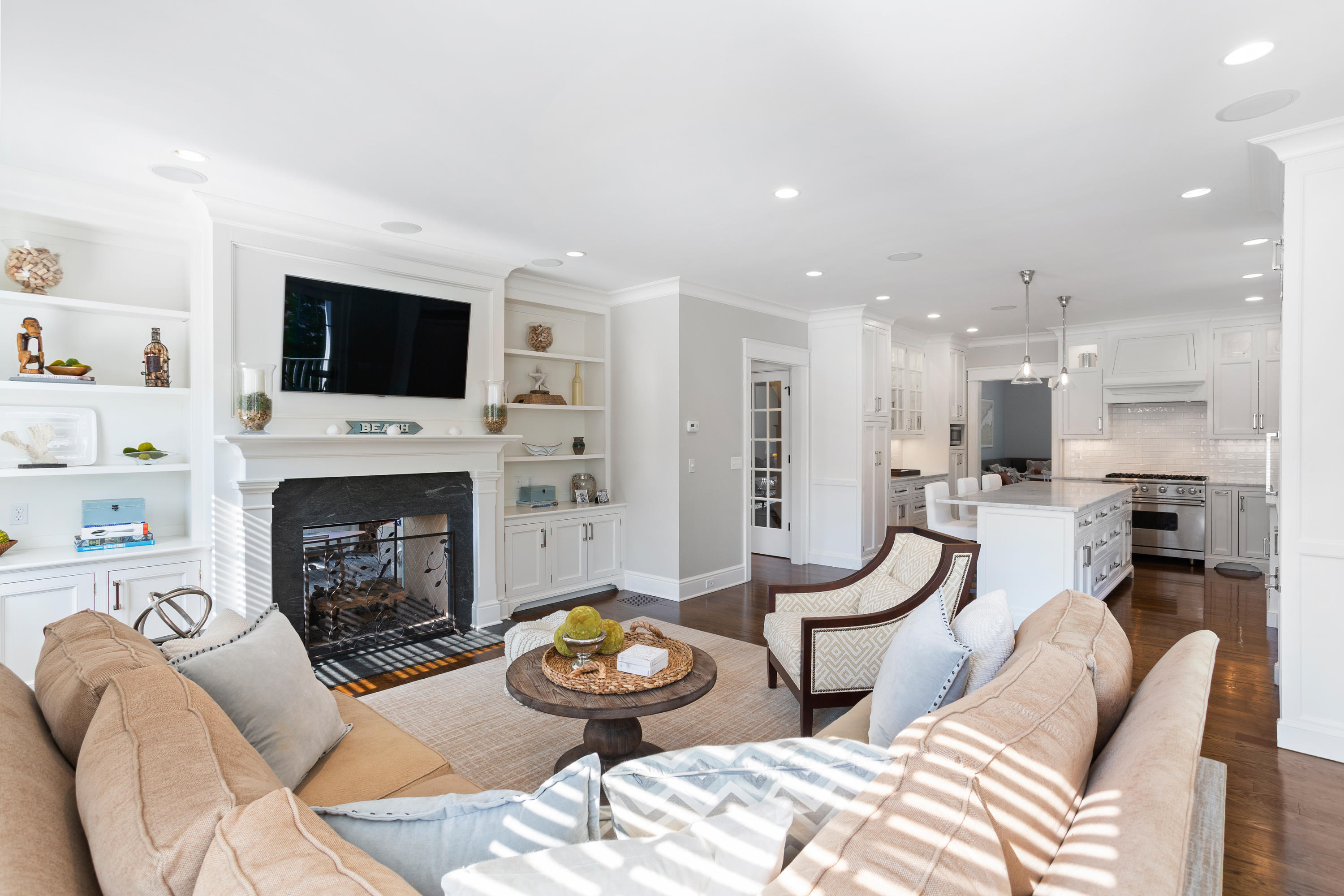 9 Concord Lane Darien, CT 06820 - Photo 14 of 36 a living room with furniture and a fireplace