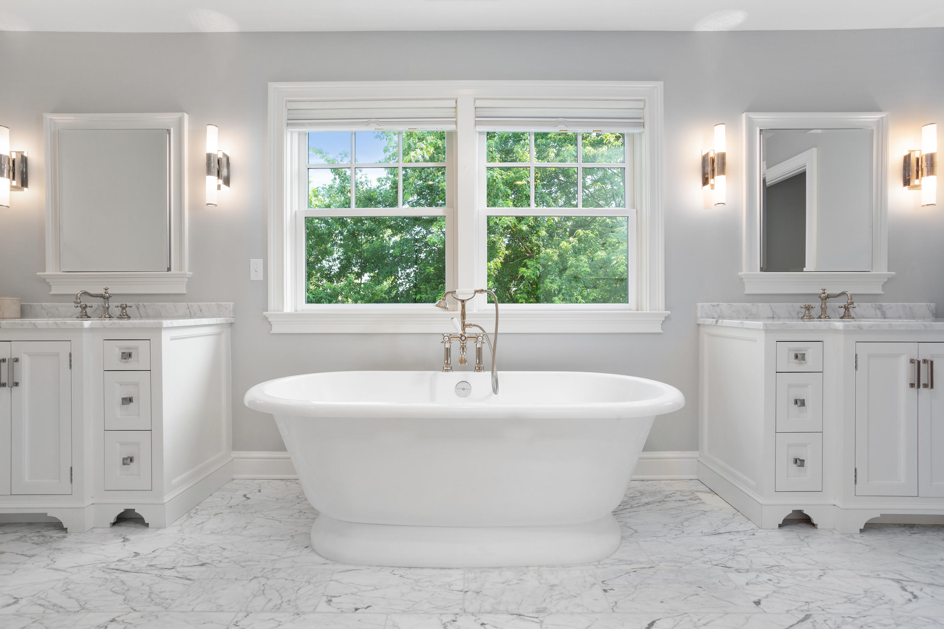 9 Concord Lane Darien, CT 06820 - Photo 19 of 36 a white bath tub sitting in a bathroom