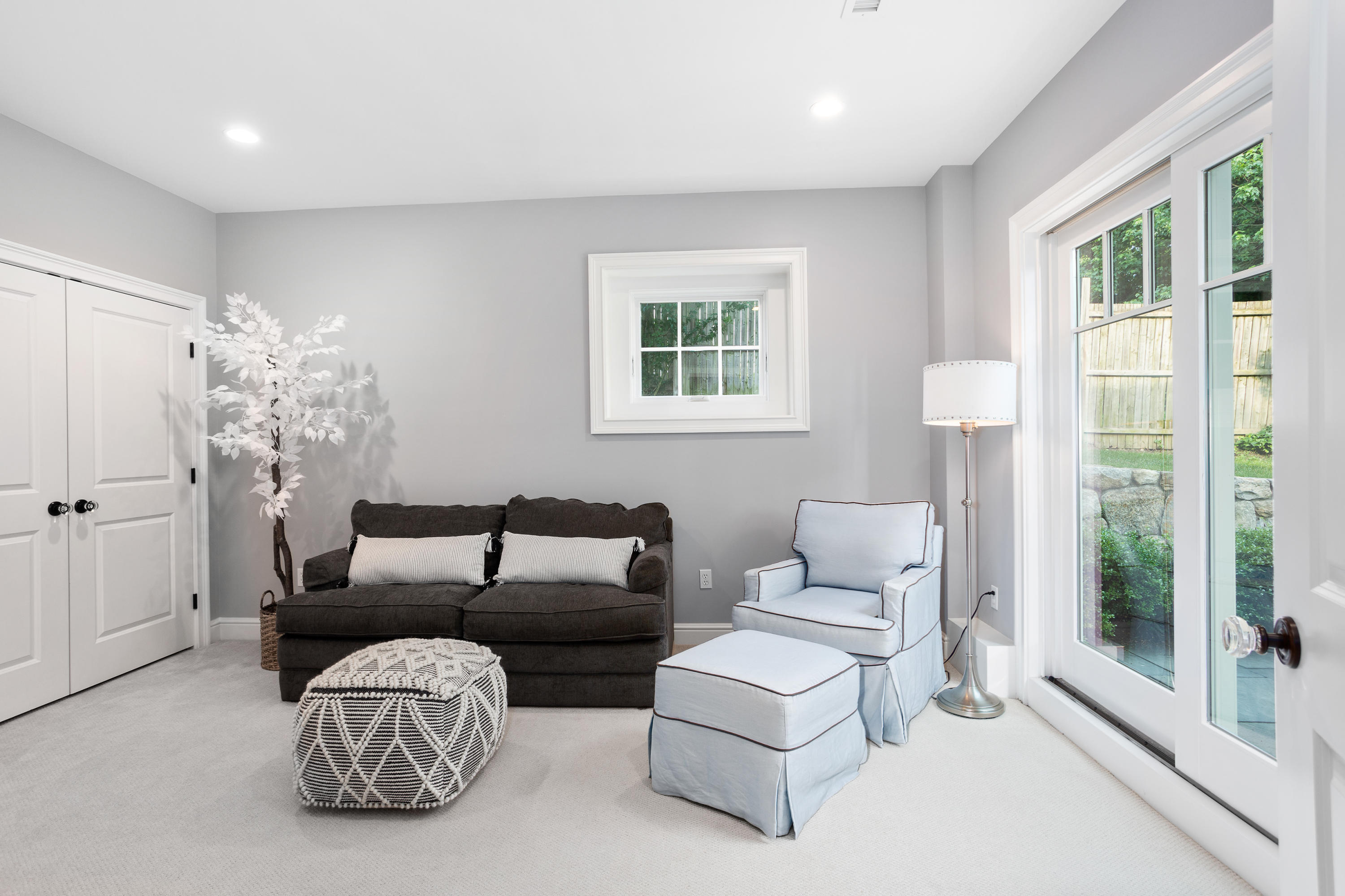 9 Concord Lane Darien, CT 06820 - Photo 30 of 36 a living room with furniture and a large window