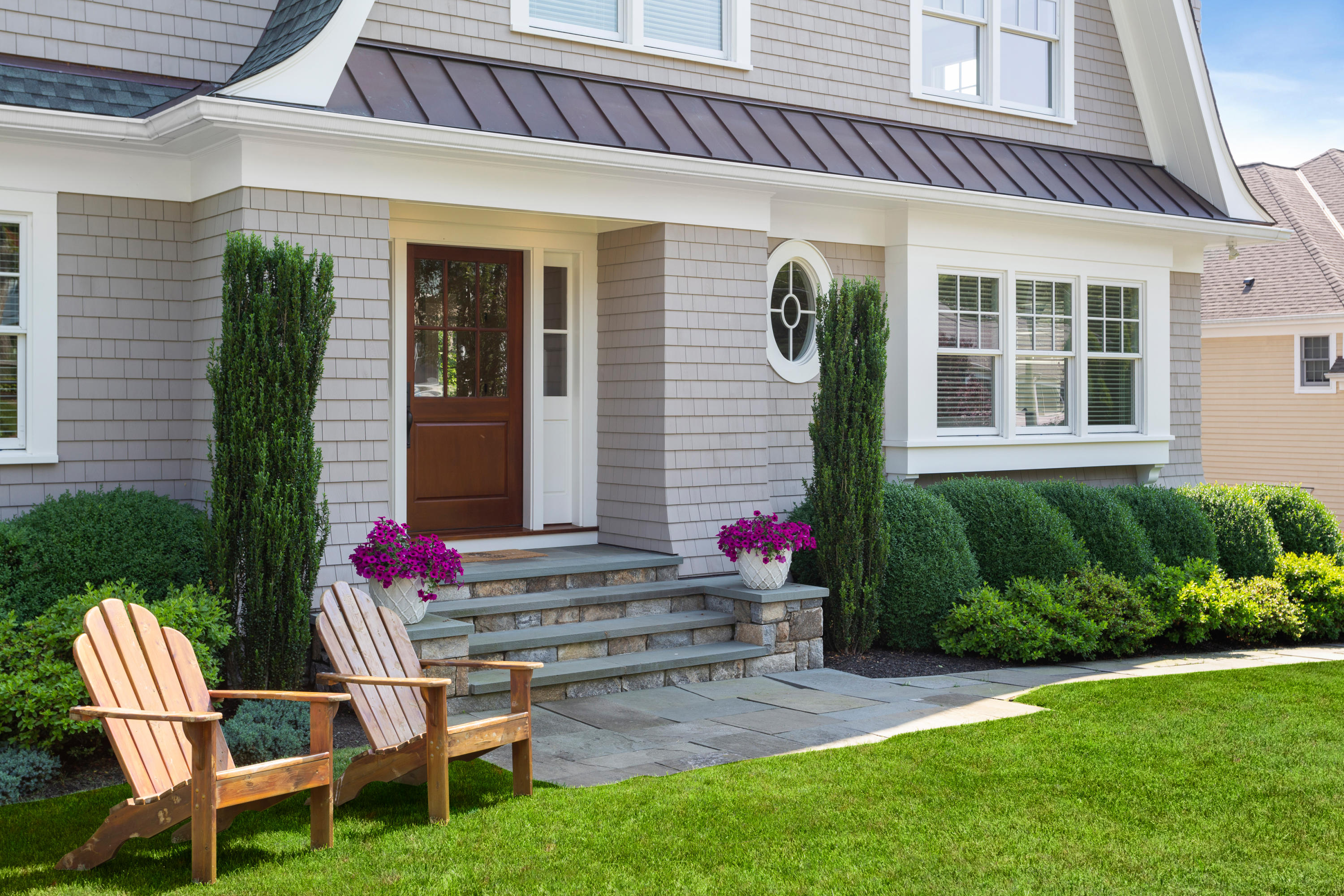 9 Concord Lane Darien, CT 06820 - Photo 35 of 36 a front view of a house with a porch