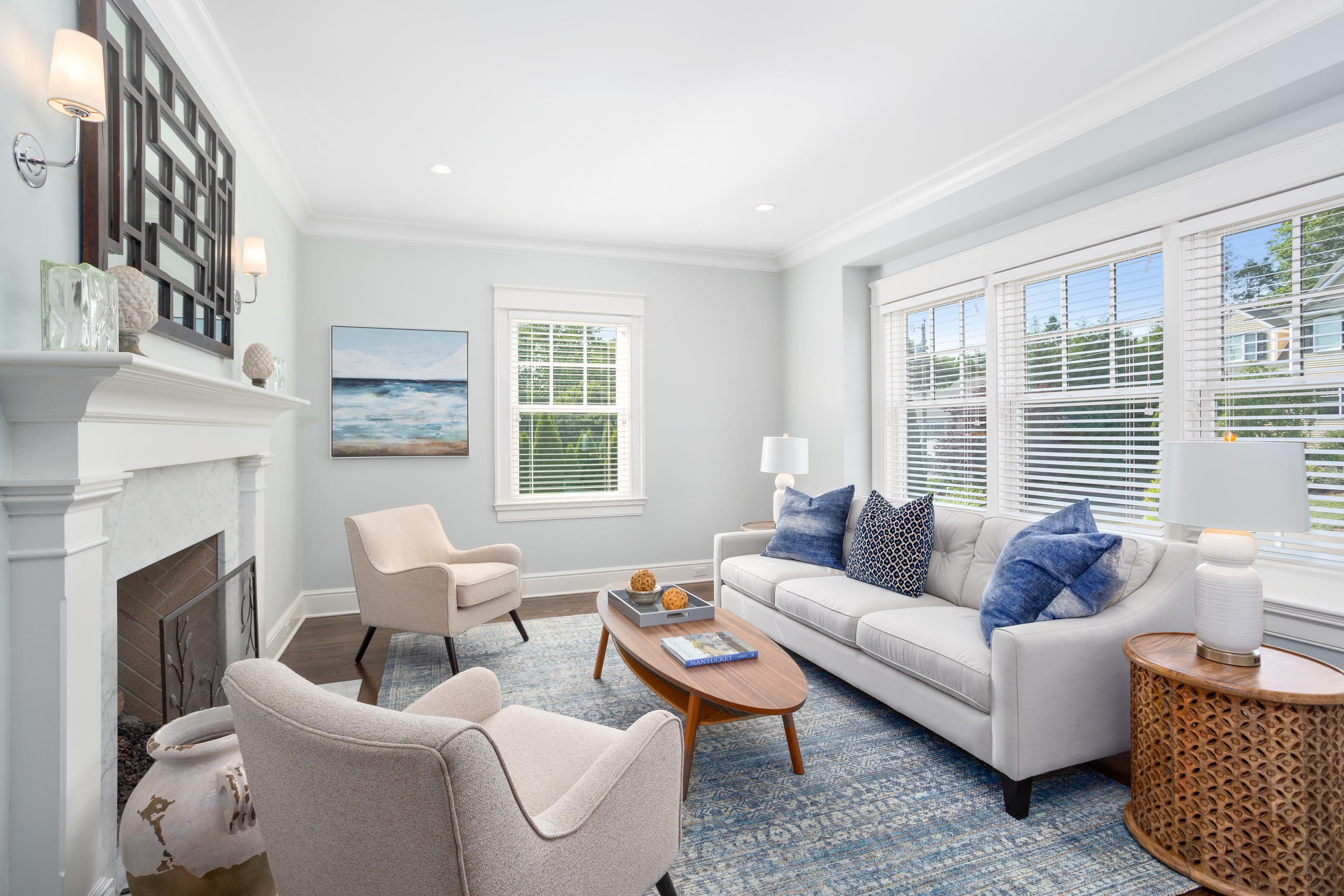9 Concord Lane Darien, CT 06820 - Photo 7 of 36 a living room with furniture a fireplace and a large window