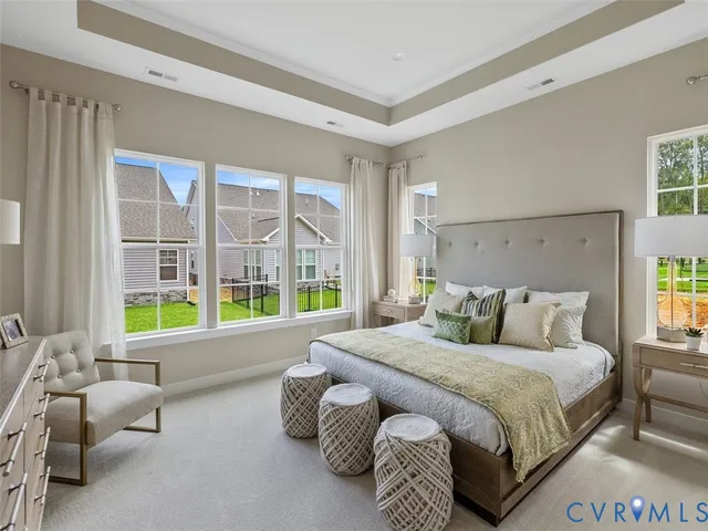 a bed room with a bed and a couch