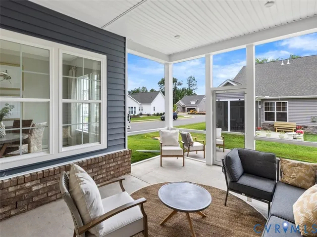 a outdoor living space with furniture and garden view