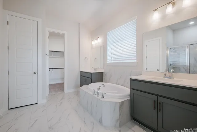 a bathroom with a sink and mirror