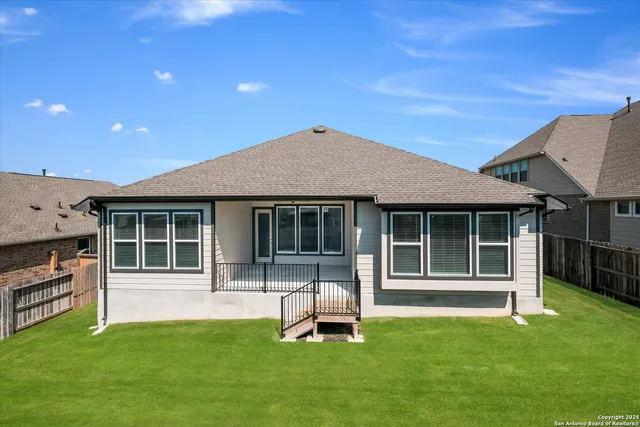 a house with garden in front of it