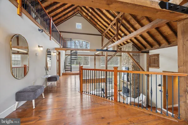a view of entryway with wooden floor