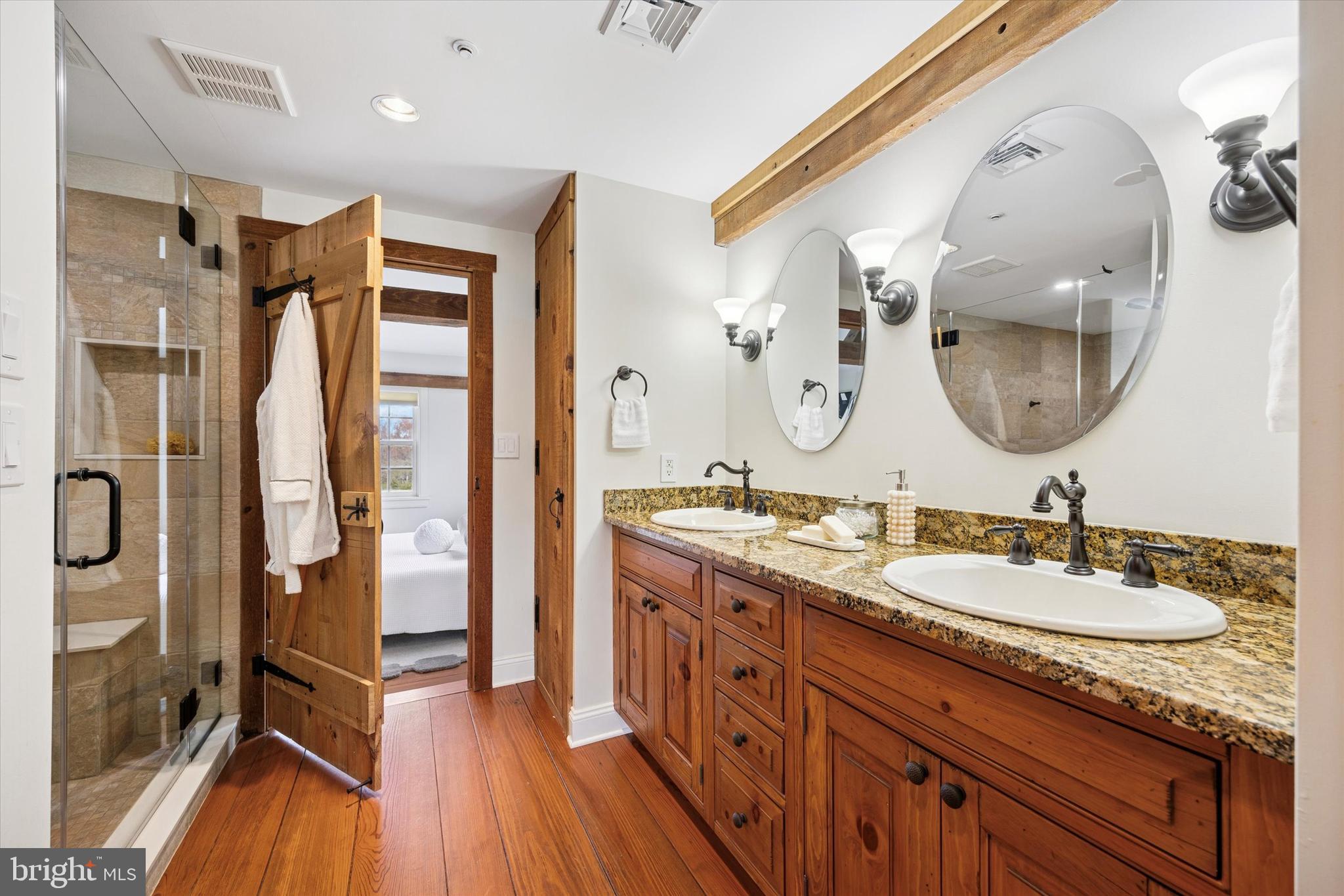3468 Holicong Road Doylestown, PA 18902 - Photo 15 of 37 a en suite bathroom with a granite countertop double vanity sink and a mirror