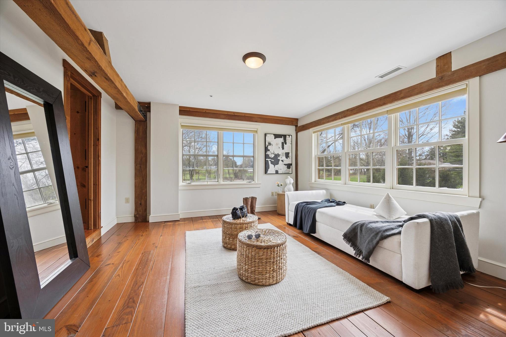 3468 Holicong Road Doylestown, PA 18902 - Photo 16 of 37 a living room with furniture and a large window
