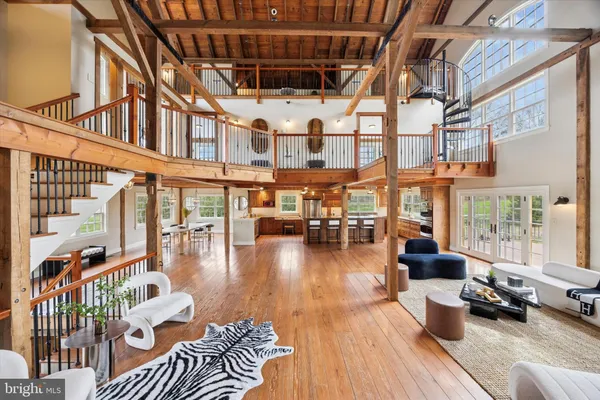 a living room with furniture or couch and a table