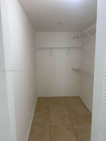a view of a room with white racks