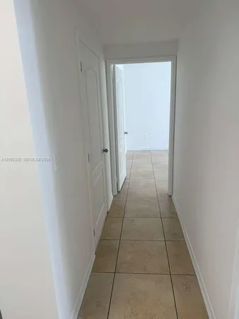 a bathroom with a vanity and a shower