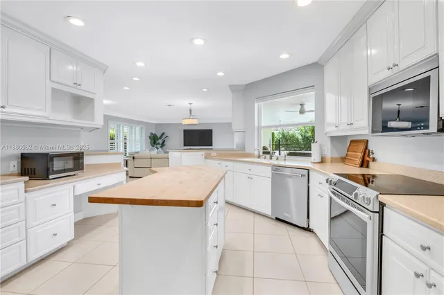 a view of a swimming pool with chairs