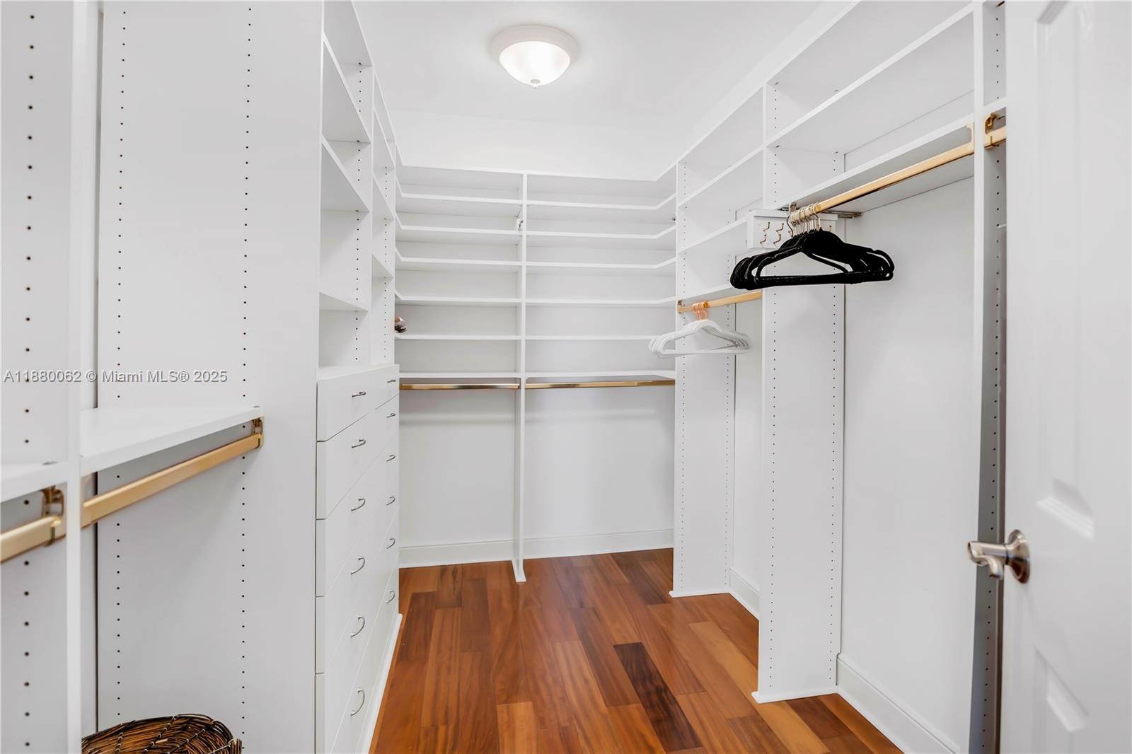 3921 Northeast 31st Avenue Lighthouse Point, FL 33064 - Photo 21 of 64 a view of walk in closet with empty racks