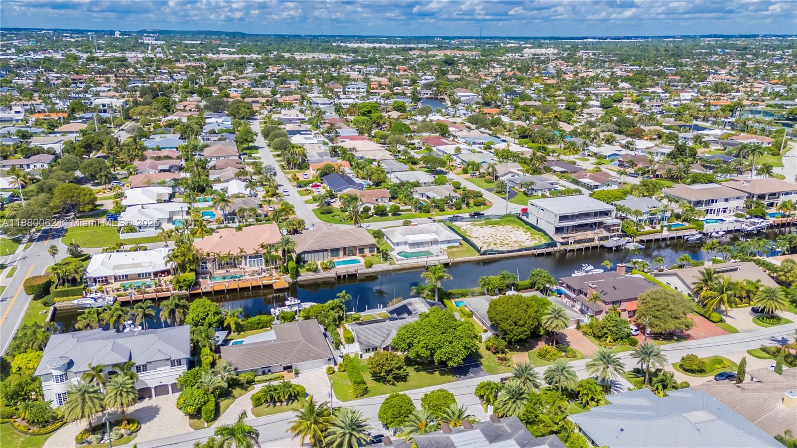 3921 Northeast 31st Avenue Lighthouse Point, FL 33064 - Photo 49 of 64 an aerial view of residential houses with outdoor space