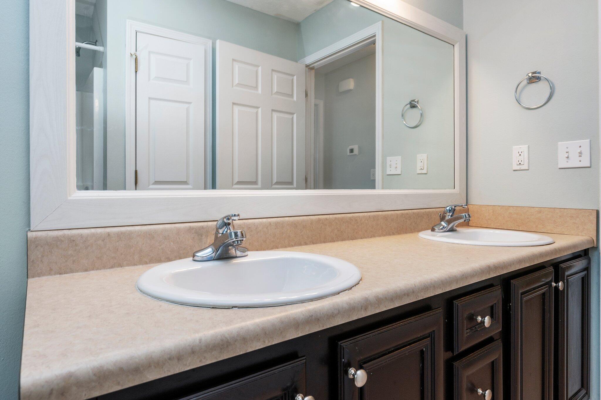 7 Snook Road Mary Esther, FL 32569 - Photo 11 of 38 a bathroom with a sink and a mirror