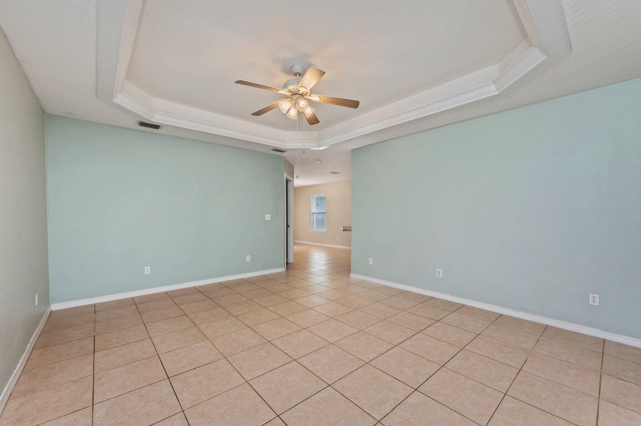 7 Snook Road Mary Esther, FL 32569 - Photo 13 of 38 a view of an empty room with a window