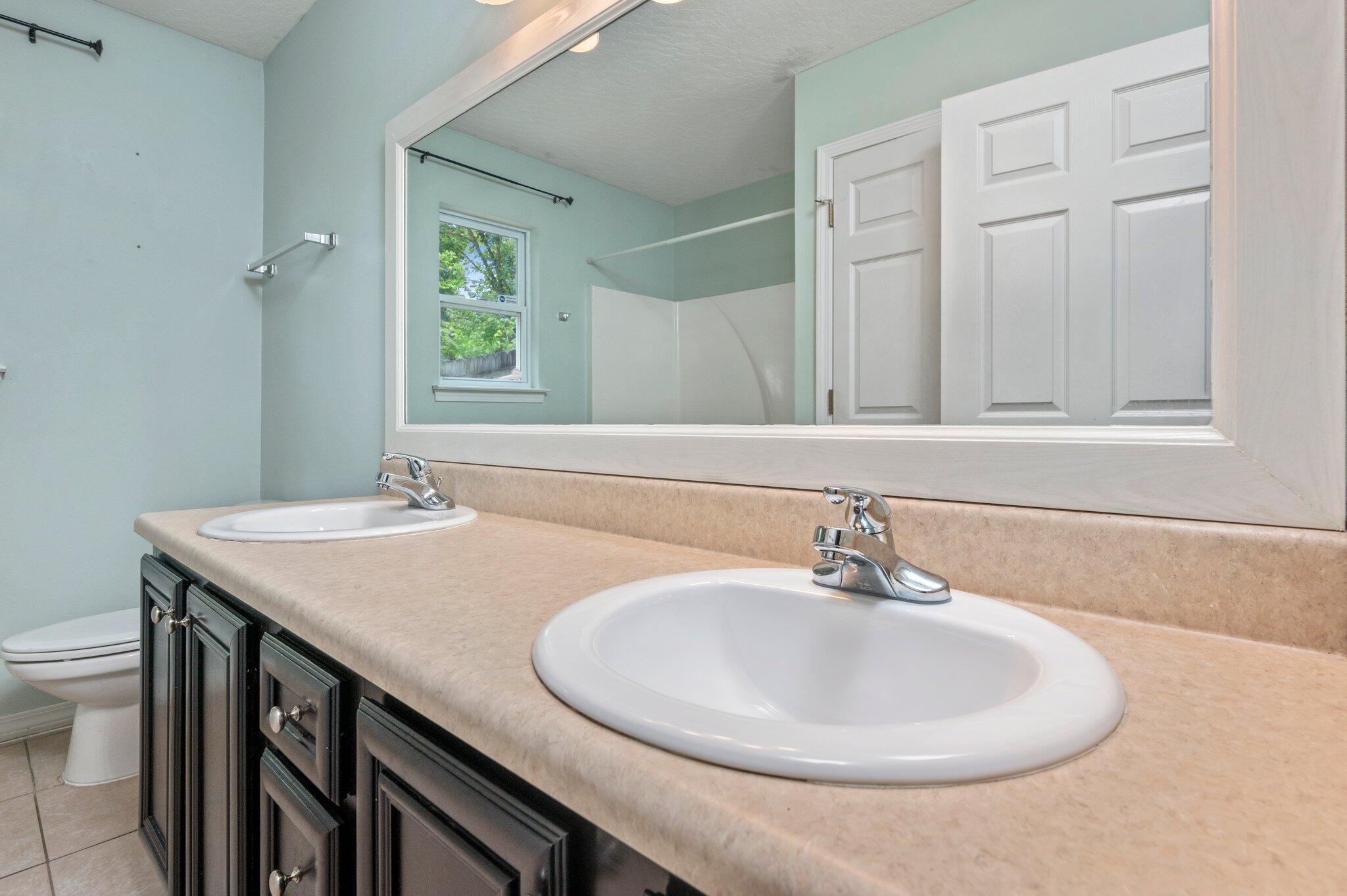 7 Snook Road Mary Esther, FL 32569 - Photo 10 of 38 a bathroom with a sink and a mirror
