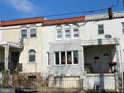 a front view of a house with balcony