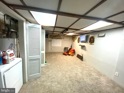 a view of outdoor space and wooden deck