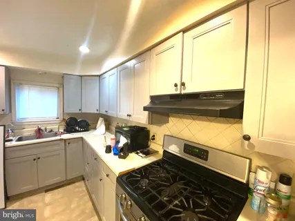 a bedroom with a bed and furniture