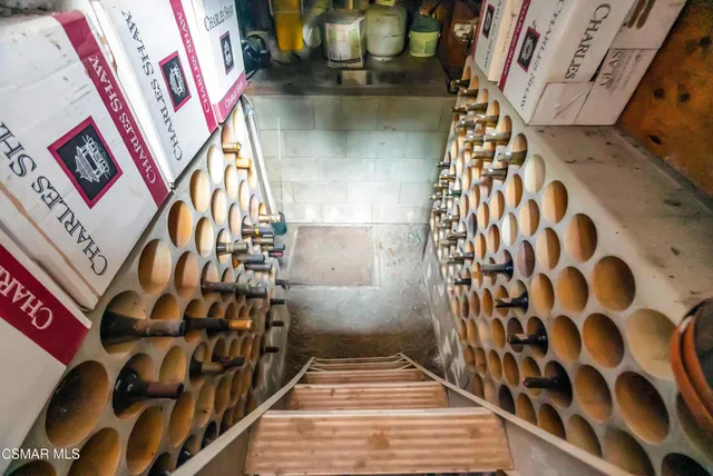 a aerial view of a house with yard swimming pool and outdoor seating