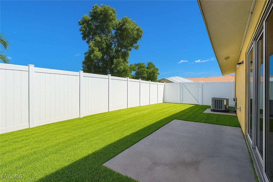 4532 Southwest 8th Place, Unit A Cape Coral, FL 33914 - Photo 13 of 14 a view of a backyard with backyard
