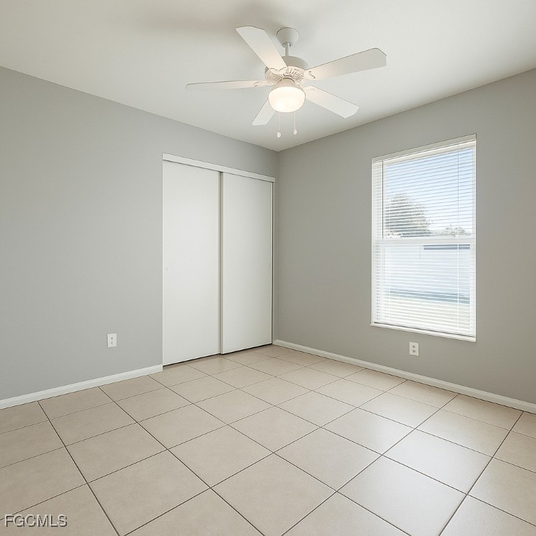 4532 Southwest 8th Place, Unit A Cape Coral, FL 33914 - Photo 9 of 14 a view of an empty room with a window