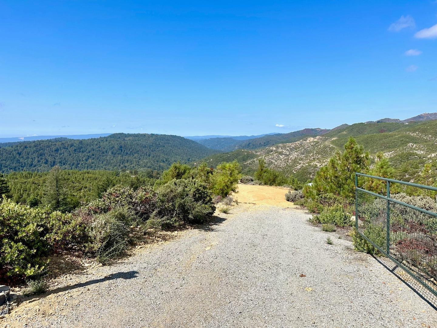 0 Ormsby Cutoff Los Gatos, CA 95076 - Photo 3 of 20 a view of a lake with mountains in the background