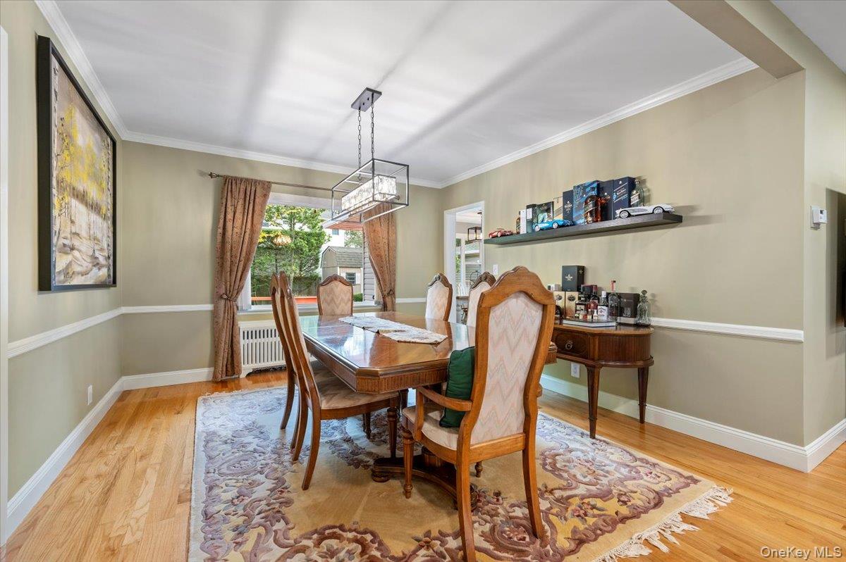 1109 Round Swamp Road Old Bethpage, NY 11804 - Photo 11 of 50 a view of a dining room with furniture window and wooden floor