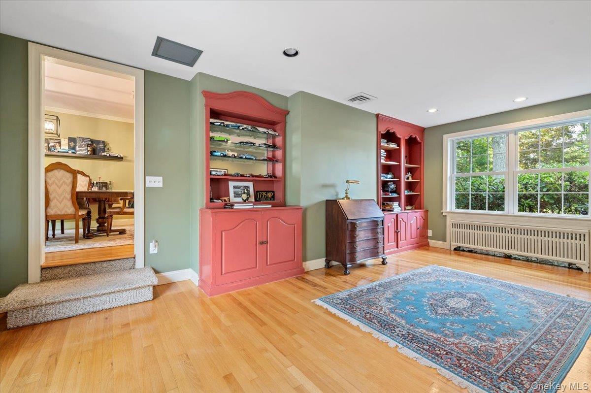 1109 Round Swamp Road Old Bethpage, NY 11804 - Photo 27 of 50 a bed room with a bed and a window