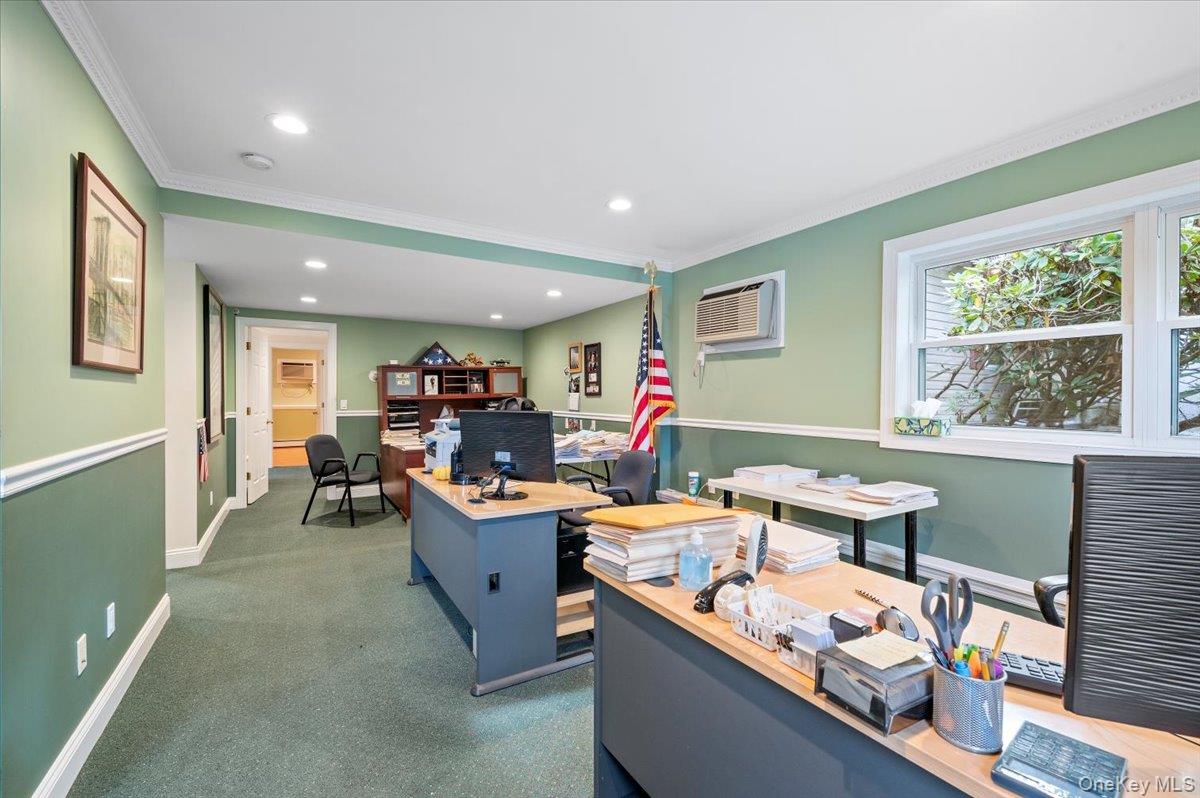 1109 Round Swamp Road Old Bethpage, NY 11804 - Photo 34 of 50 a room with furniture and window