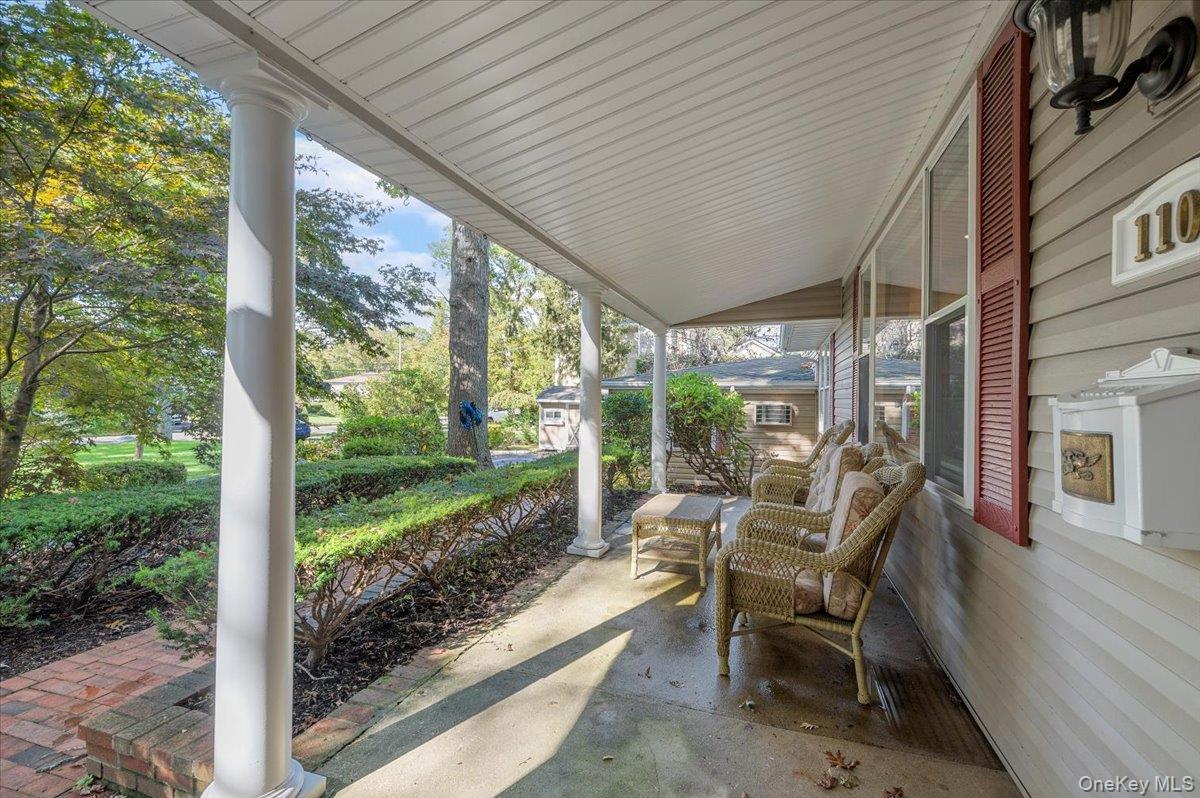 1109 Round Swamp Road Old Bethpage, NY 11804 - Photo 45 of 50 a patio with yard glass top table and chairs