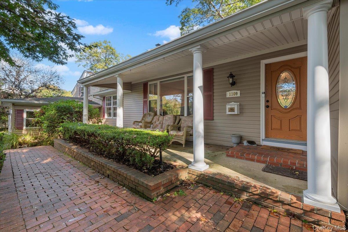 1109 Round Swamp Road Old Bethpage, NY 11804 - Photo 46 of 50 front view of a house with a yard