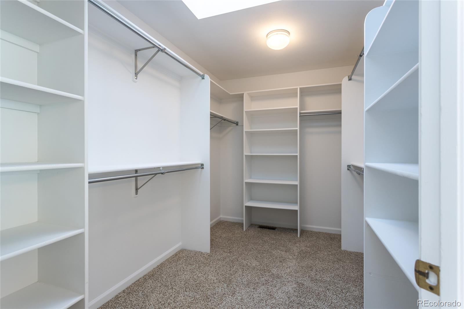 5659 College Place Boulder, CO 80303 - Photo 20 of 27 a view of walk in closet with empty racks
