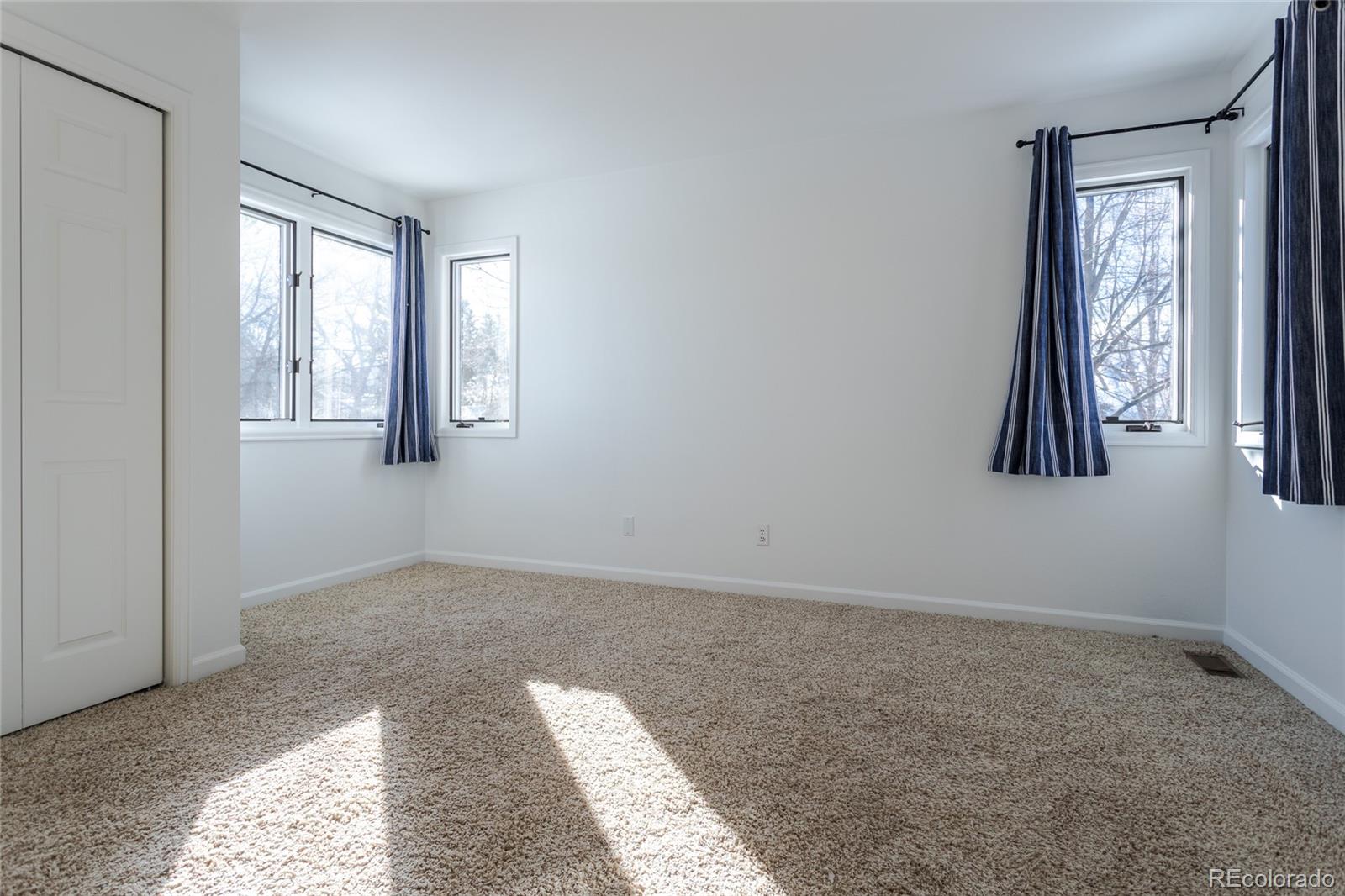 5659 College Place Boulder, CO 80303 - Photo 24 of 27 a view of an empty room and window