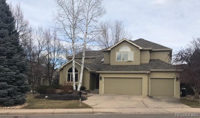 5659 College Place Boulder, CO 80303 - Photo 27 of 27 a front view of a house with garage and yard