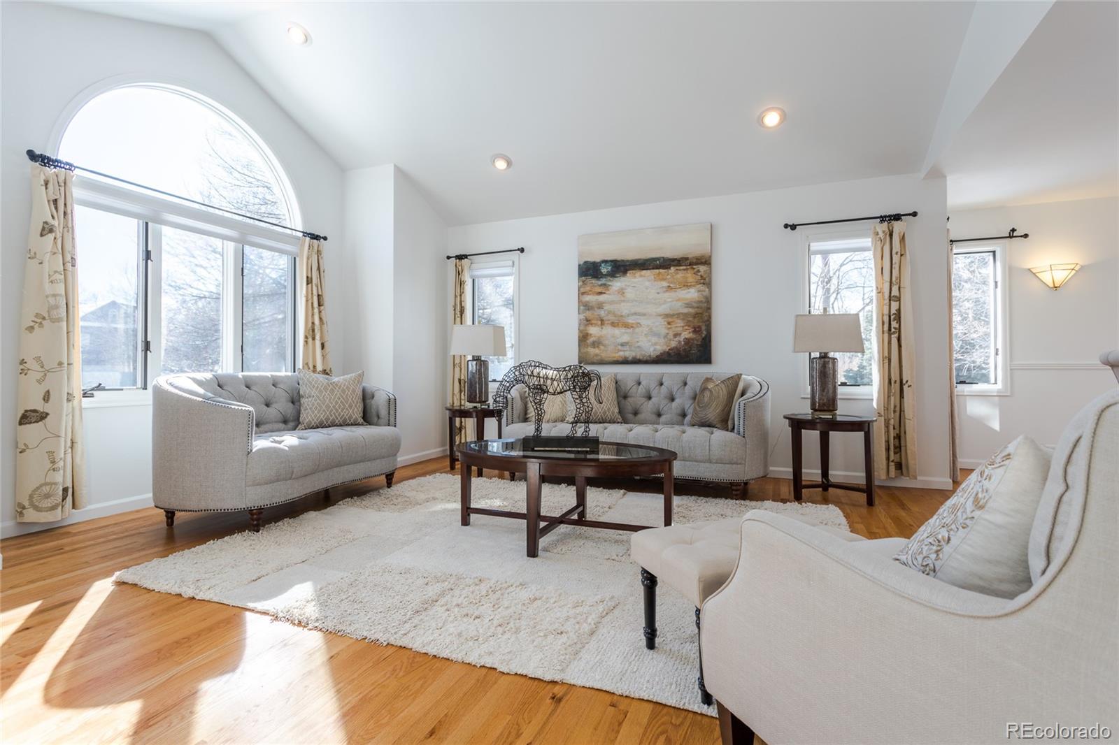 5659 College Place Boulder, CO 80303 - Photo 4 of 27 a living room with furniture and a large window