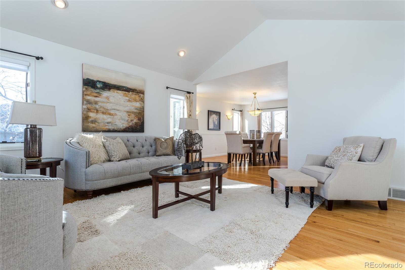 5659 College Place Boulder, CO 80303 - Photo 5 of 27 a living room with furniture and a lamp