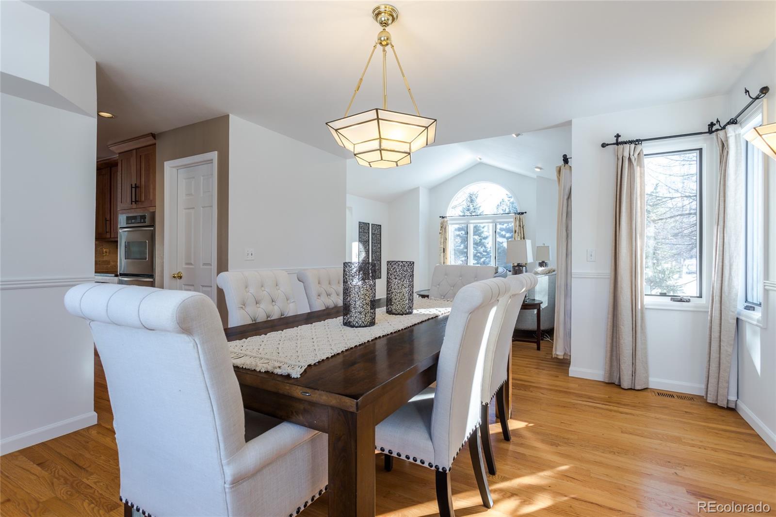5659 College Place Boulder, CO 80303 - Photo 7 of 27 a view of a dining room with furniture and window