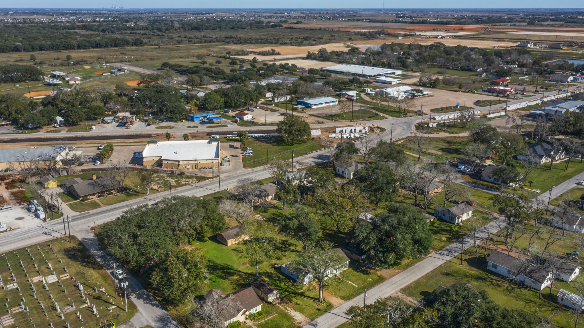 9310 Main Street Needville, TX 77461 - Photo 21 of 27 an aerial view of a city with lots of residential buildings
