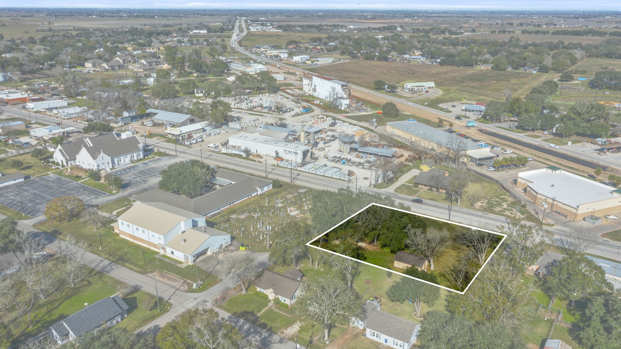 9310 Main Street Needville, TX 77461 - Photo 24 of 27 an aerial view of residential houses with outdoor space