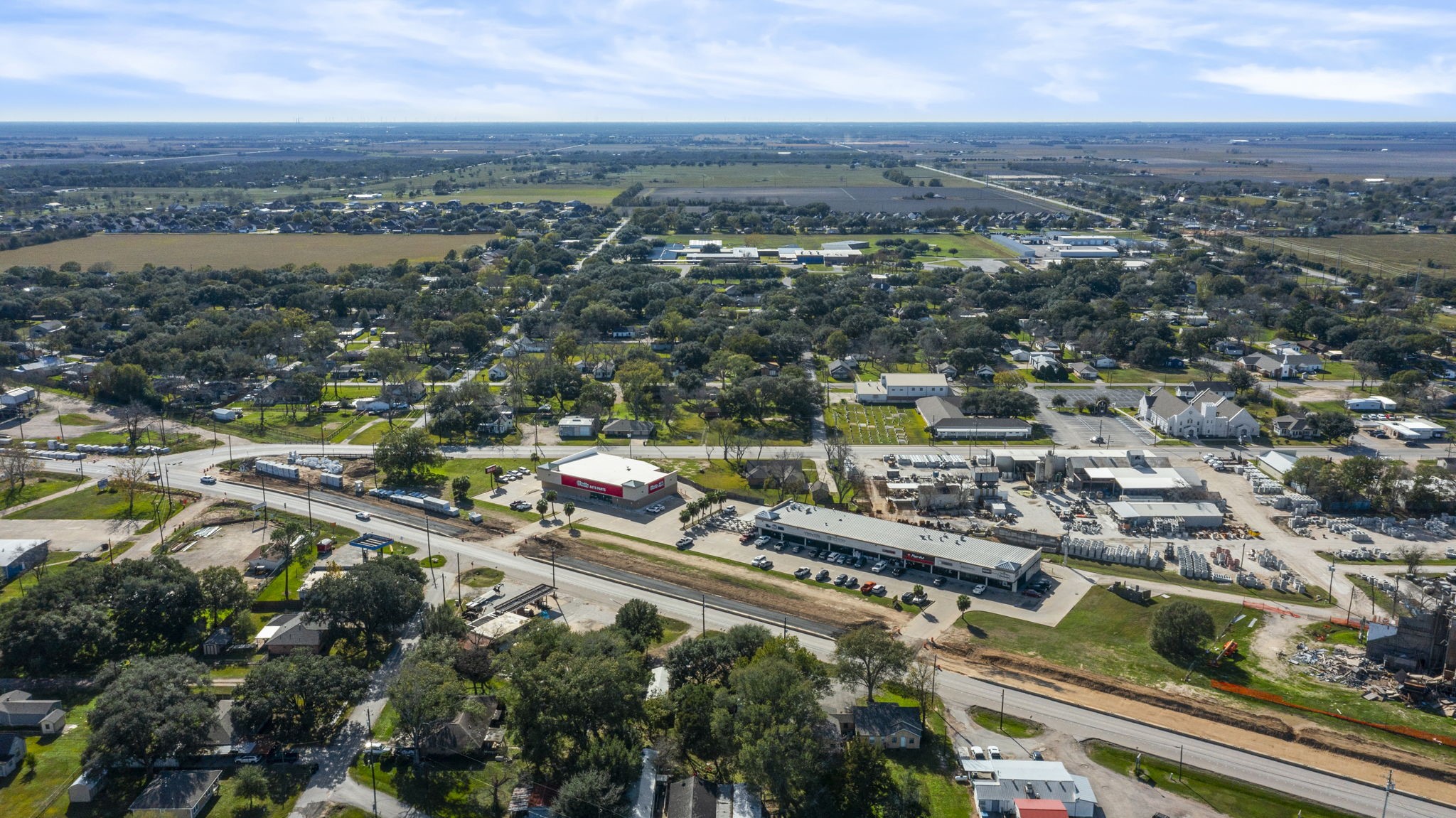 9310 Main Street Needville, TX 77461 - Photo 26 of 27 an aerial view of residential houses with outdoor space