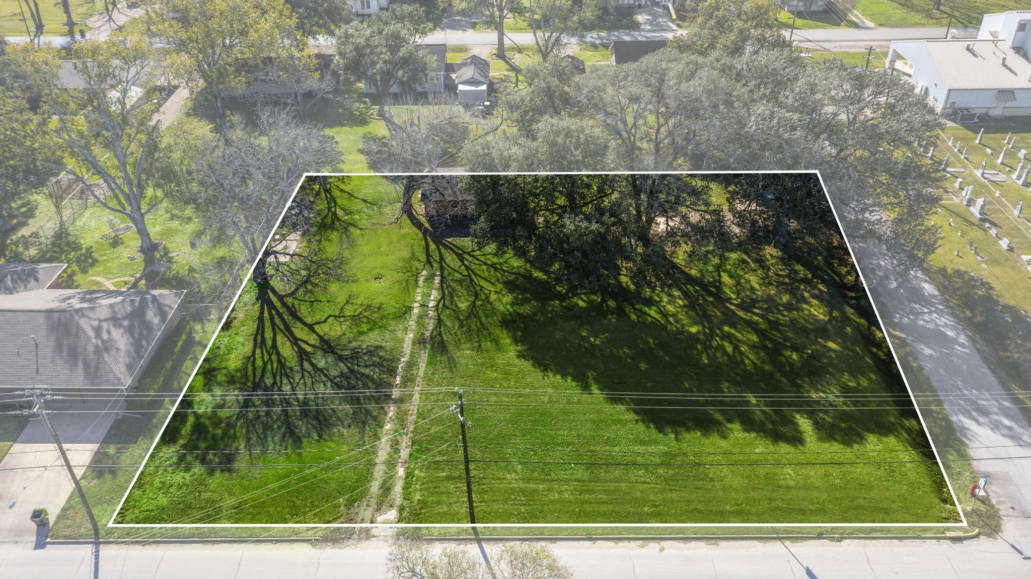 9310 Main Street Needville, TX 77461 - Photo 4 of 27 a view of a yard