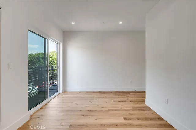 a view of an empty room and window