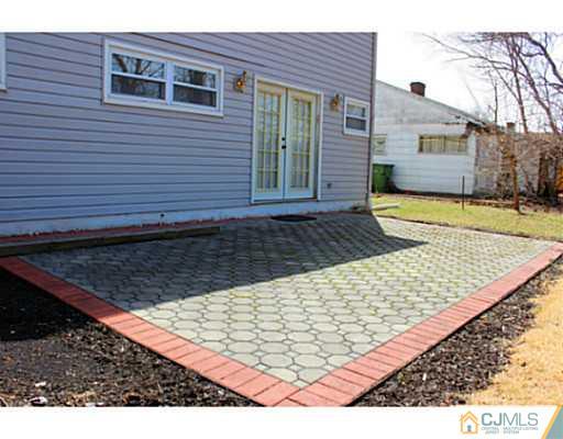 166 Winthrop Road Edison, NJ 08817 - Photo 16 of 17 a view of a backyard of the house