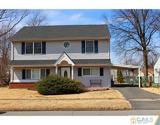 166 Winthrop Road Edison, NJ 08817 - Photo 17 of 17 a front view of a house with a yard