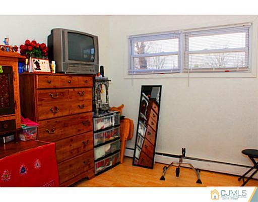 166 Winthrop Road Edison, NJ 08817 - Photo 5 of 17 a view of a workspace with furniture